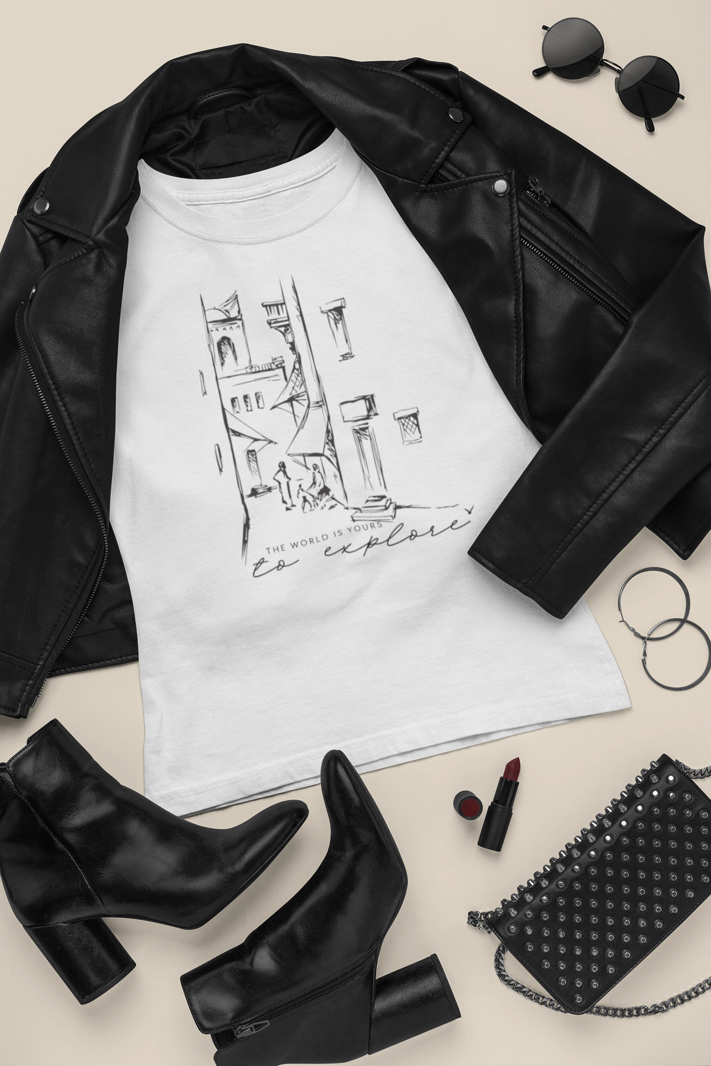 outfit-mockup-featuring-a-t-shirt-surrounded-by-dark-leather-girly-garments-26395.png